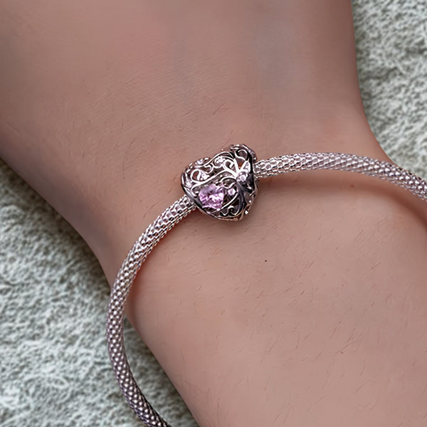 Herz Charm Anhänger aus 925er Sterlingsilber mit rosa Herz Zirkonia und funkelnden Kristallen für Charm Armband.