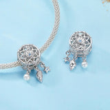 Silberner Traumfänger Charm mit Muschelmotiven – inspiriert vom Ozean, der Unterwasserwelt & als Schutzengel-Symbol. Perfekt für Meeresliebhaber. 🌊🐚✨