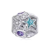 Unterwasser Charm aus 925er Silber mit Muschel- und Seestern-Motiven in Lila und Blau – maritimer Anhänger als Symbol für Ruhe und Meeresmagie.